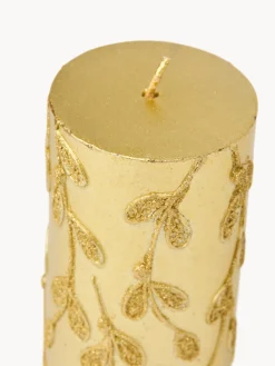 Candela con decorazioni glitter