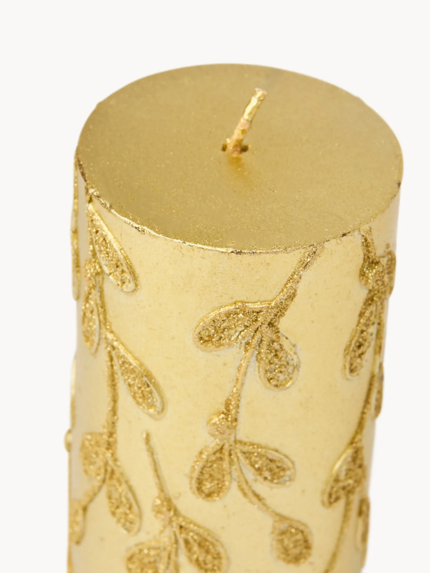 Candela con decorazioni glitter