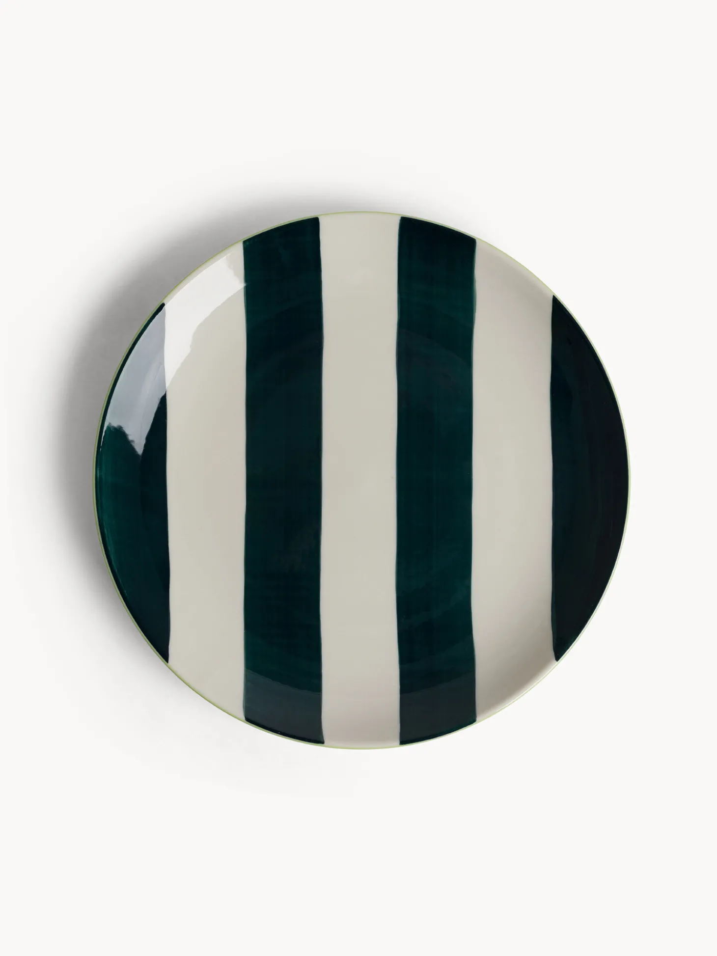 Piatto piano in ceramica a righe