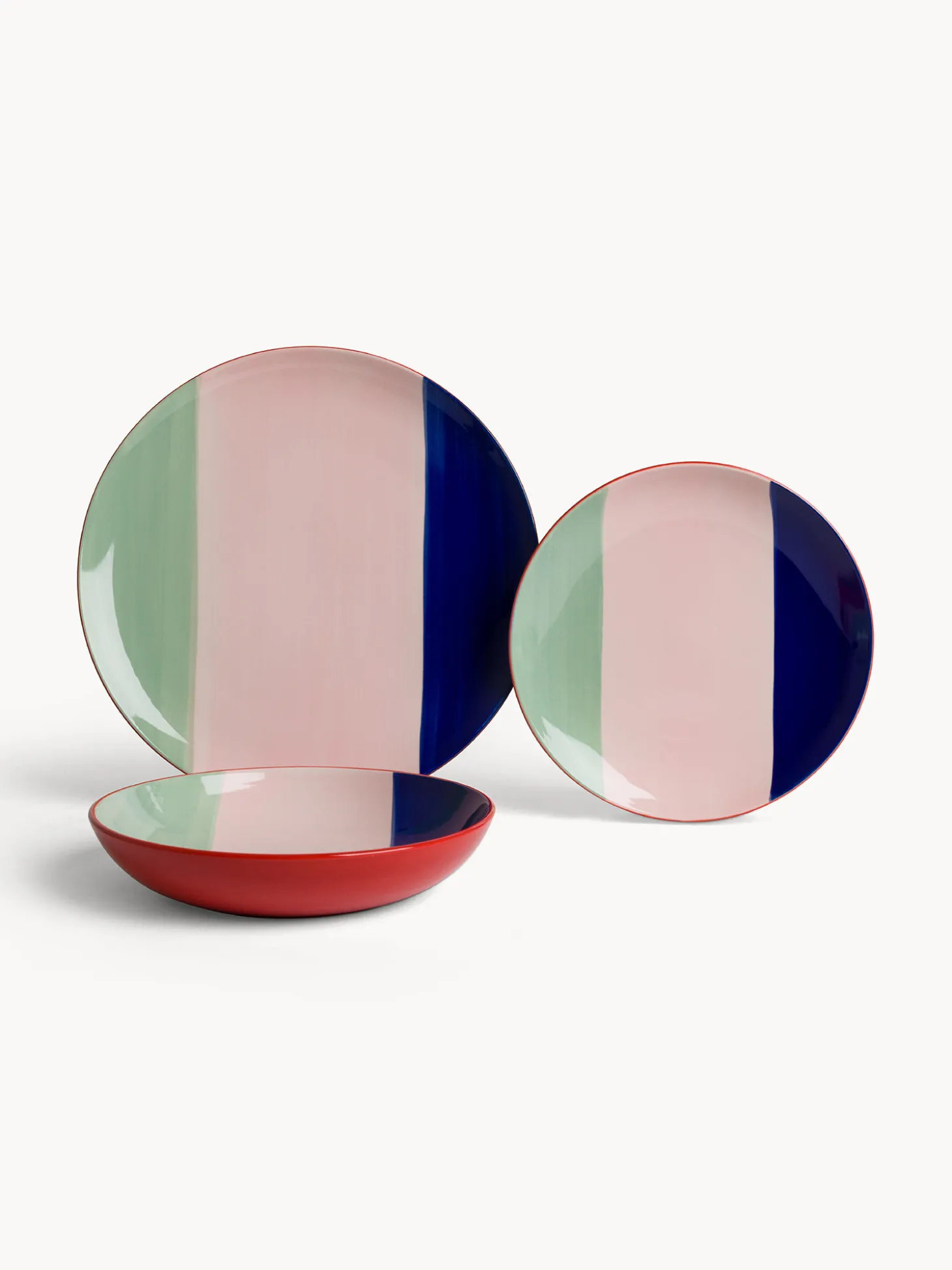 Piatto piano in ceramica a righe colorate