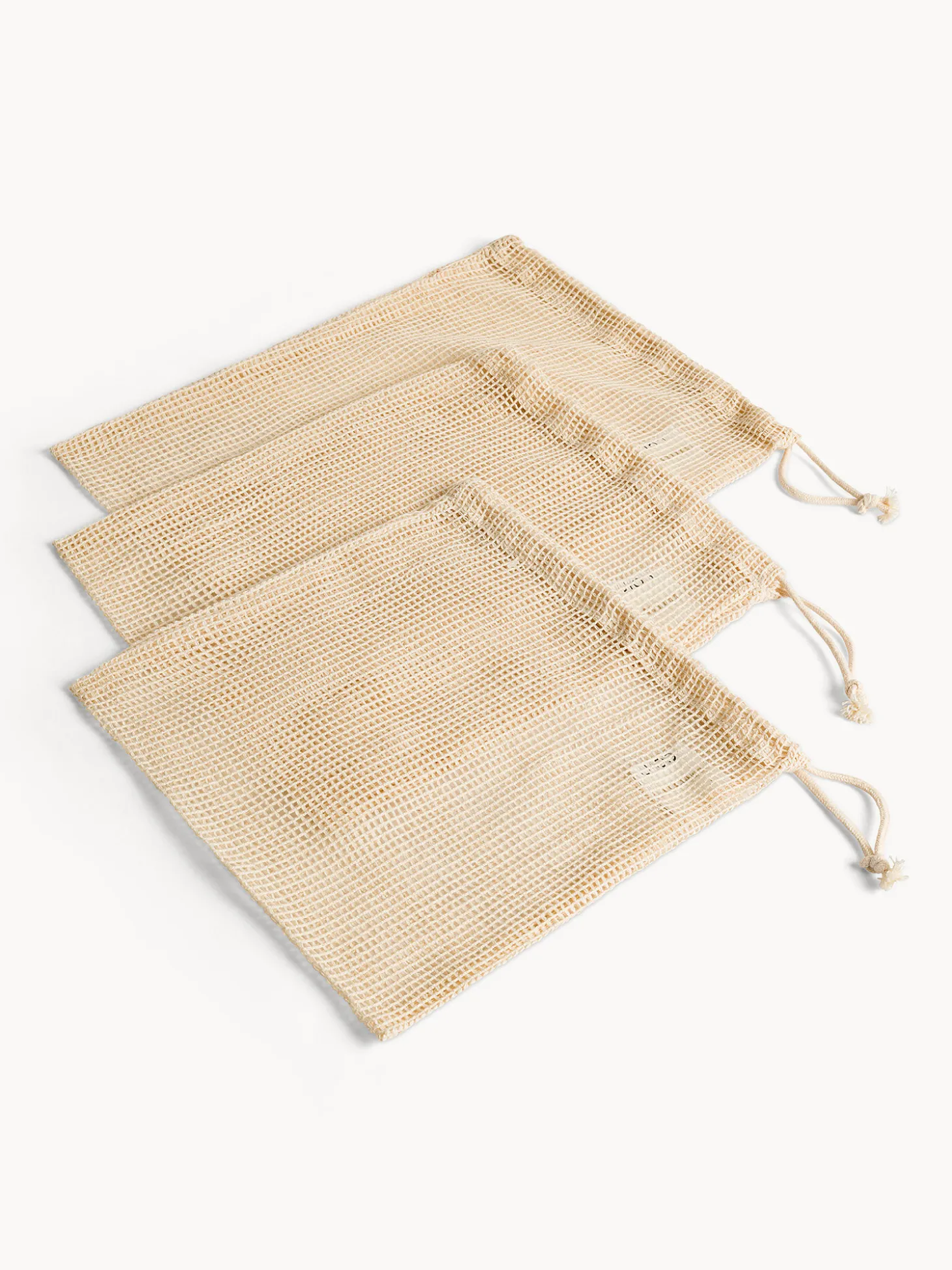 Set 3 sacchetti a rete in puro cotone con laccio regolabili