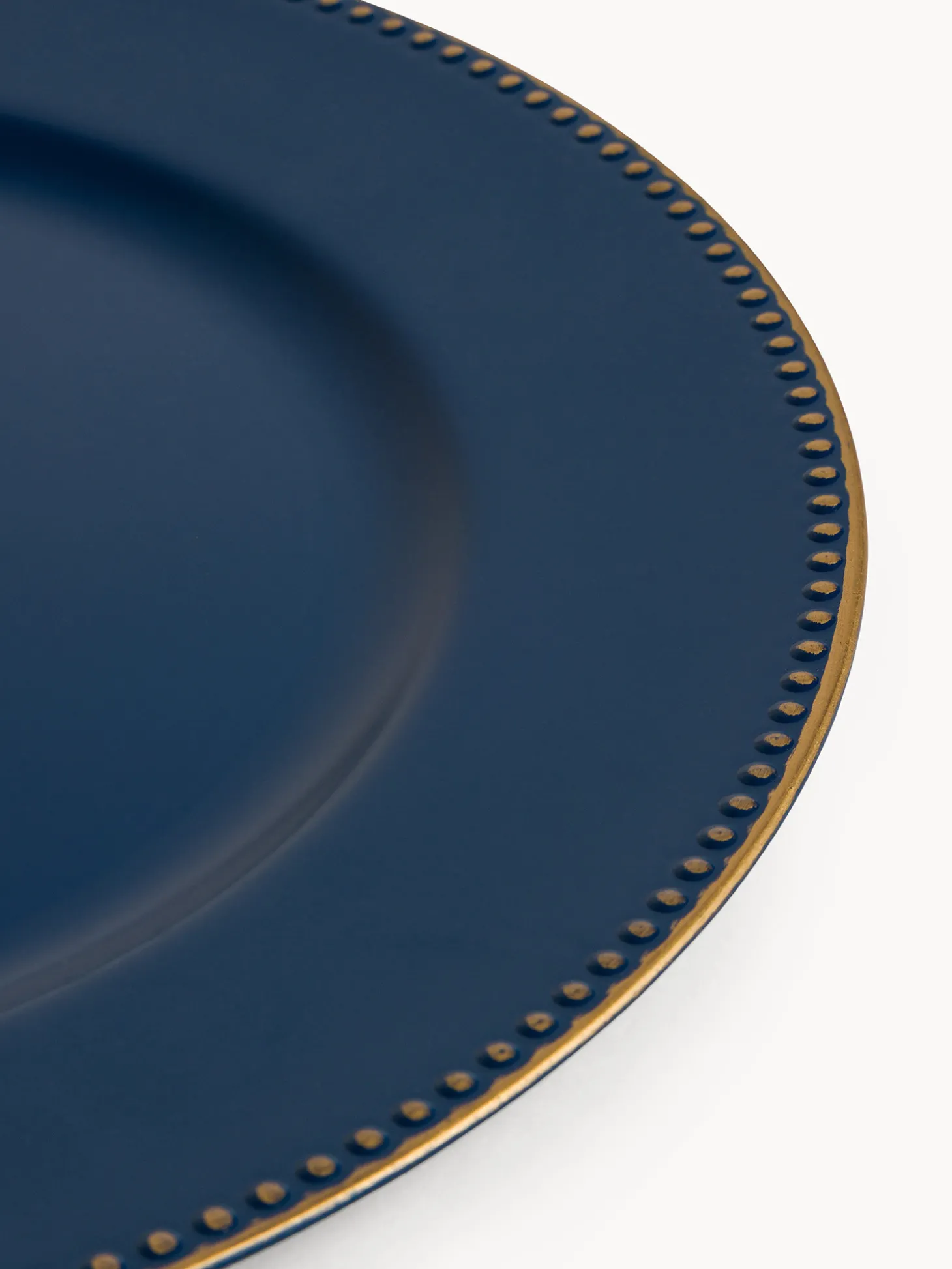 Sottopiatto in plastica con filo oro