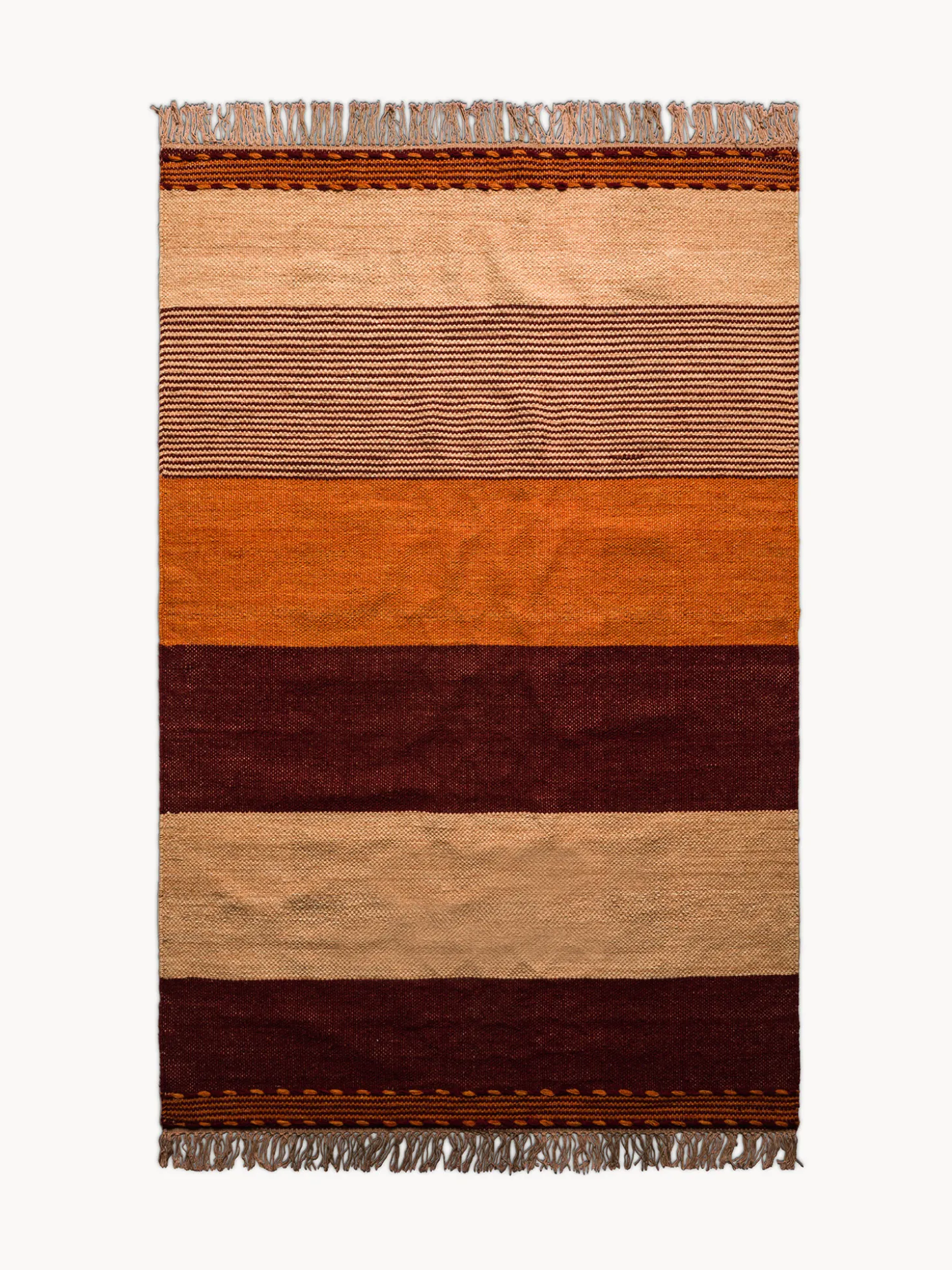 Tappeto in misto lana con fasce colorate e frange