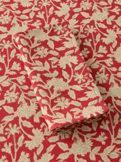 Tovaglia in puro cotone con stampa manuale e dettagli d'oro