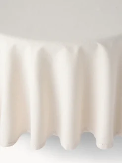 Tovaglia rotonda in cotone e lurex con orlo à jour